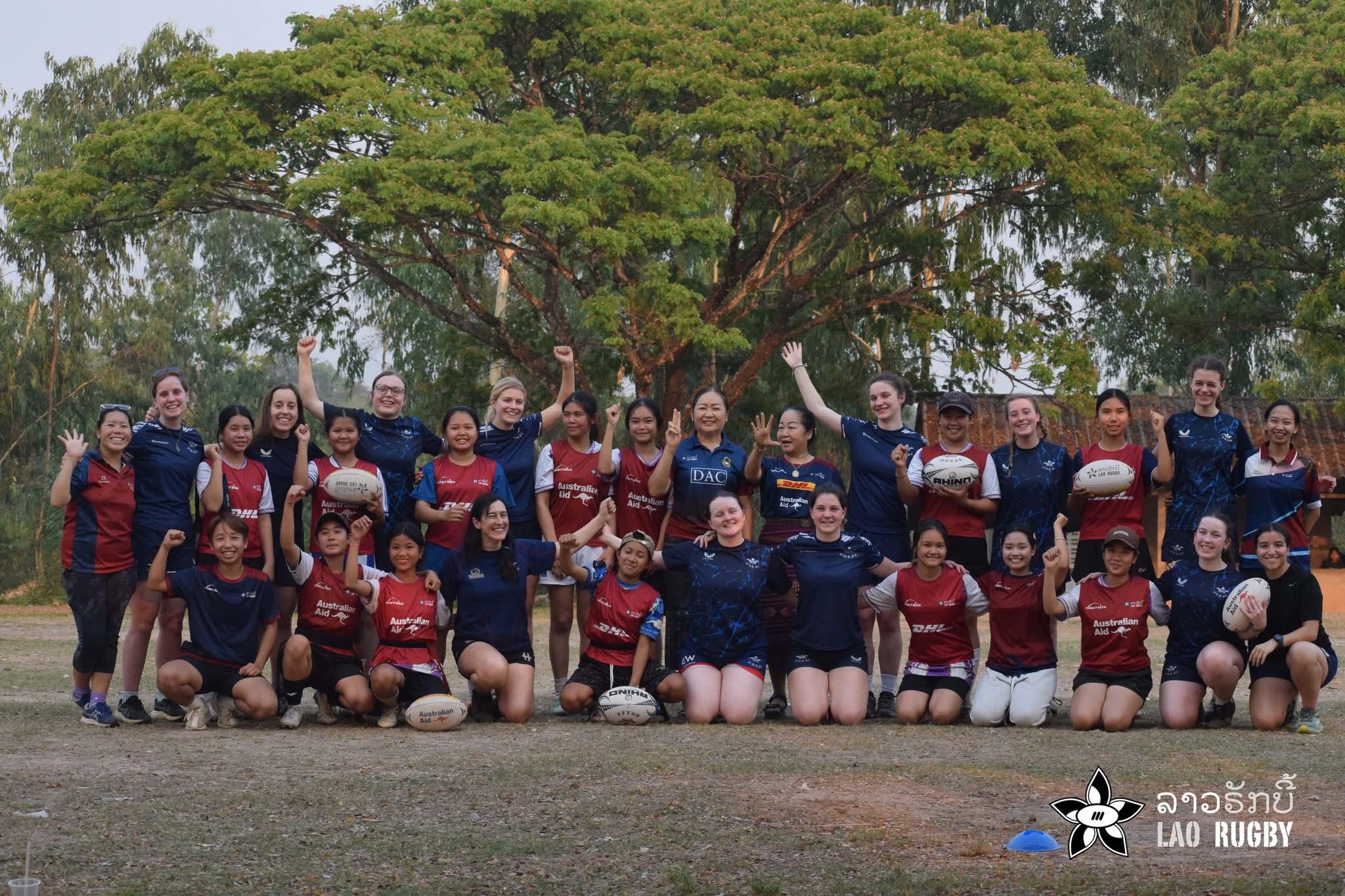 OURFC players on tour with Lao Rugby — team photo under the tree